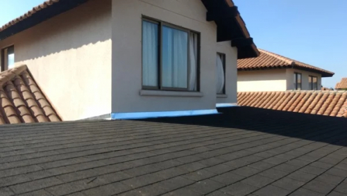 Instalador de tejas asf&aacute;lticas en &Ntilde;u&ntilde;oa.